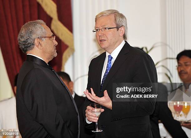 Australian Prime Minister Kevin Rudd talks to East Timor's President Jose Ramos Horta as they attend an event on the occassion of the inaugeration of...