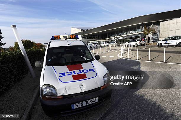 Police car is parked on October 20, 2009 in front of Mulhouse hospital where German doctor Dieter Krombach might be detained after having been found...