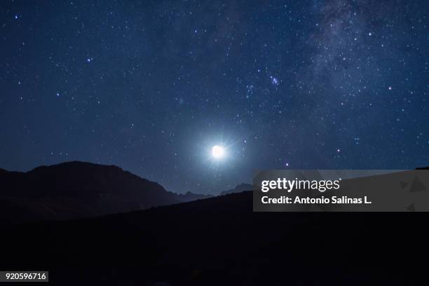 stars landscape with mountains - los andes mountain range in santiago de chile chile stock pictures, royalty-free photos & images