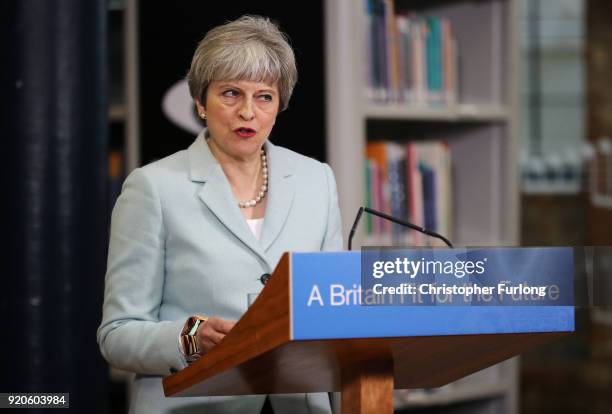 British Prime Minister Theresa May delivers a speech to students and staff during her visit to Derby College on February 19, 2018 in Derby, England....