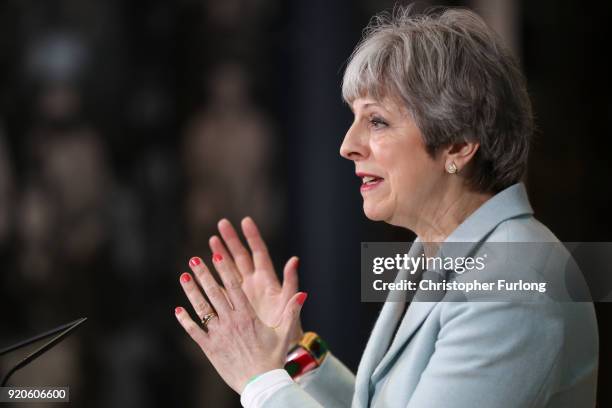 British Prime Minister Theresa May delivers a speech to students and staff during her visit to Derby College on February 19, 2018 in Derby, England....