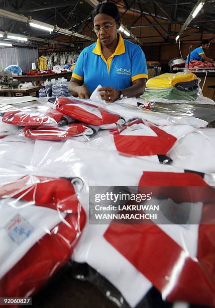 Sri Lankan worker packs T-shirts at a garment factory in Colombo suburb Maharagama on October 20, 2009. Sri Lanka has agreed to study a European...
