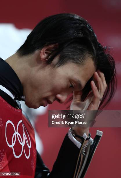 Taku Takeuchi of Japan looks on during the Ski Jumping - Men's Team Large Hill on day 10 of the PyeongChang 2018 Winter Olympic Games at Alpensia Ski...