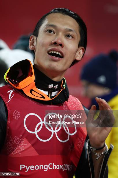 Taku Takeuchi of Japan looks on during the Ski Jumping - Men's Team Large Hill on day 10 of the PyeongChang 2018 Winter Olympic Games at Alpensia Ski...