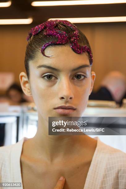 Model backstage ahead of the Sophia Webster presentation during London Fashion Week February 2018 at on February 19, 2018 in London, England.