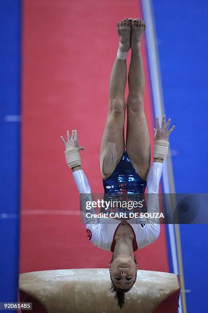 France's Pauline Morel performs in the vault event in the women's individual all-around final during the Artistic Gymnastics World Championships 2009...