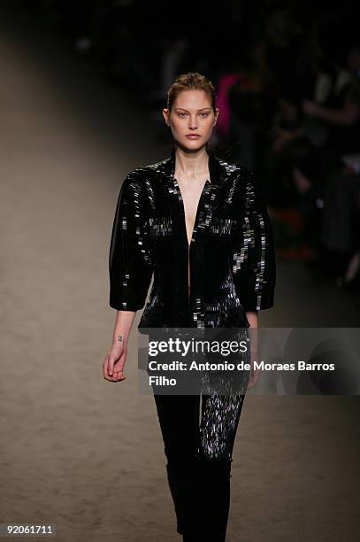 Model walks the runway at the Stella McCartney Ready-to-Wear A/W 2009 fashion show during Paris Fashion Week at Carreau du Temple on March 9, 2009 in...