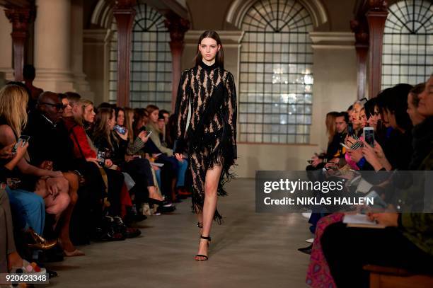 Model presents a creation from designer David Koma during their catwalk show on the fourth day of London Fashion Week Autumn/Winter 2018 in London on...