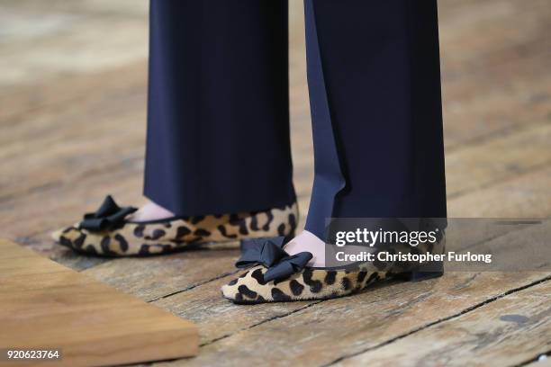 The shoes of British Prime Minister Theresa May as she delivers a speech to students and staff during her visit to Derby College on February 19, 2018...