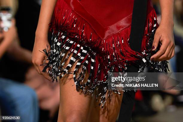 Model presents a creation from designer David Koma during their catwalk show on the fourth day of London Fashion Week Autumn/Winter 2018 in London on...