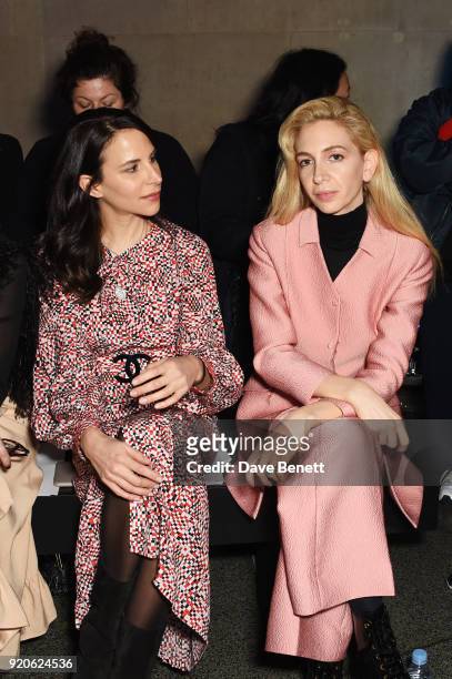 Caroline Sieber and Sabine Getty attend the Christopher Kane show during London Fashion Week February 2018 at Tate Britian on February 19, 2018 in...