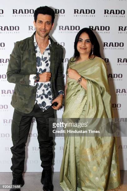 Bollywood actor Hrithik Roshan and Simran Chandhoke, Brand Manager Rado posing for photographs after the launch of Rado's new store on February 14,...