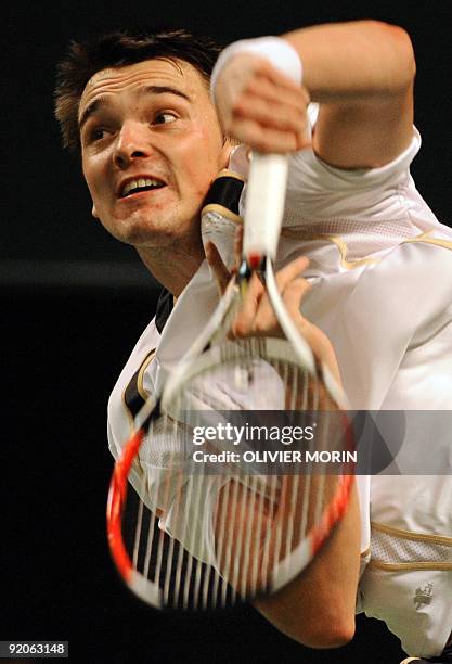 Germany's Andreas Beck serves during his match against France's Arnaud Clement in Stockholm, on October 20 on the second day of the Tennis Stockholm...