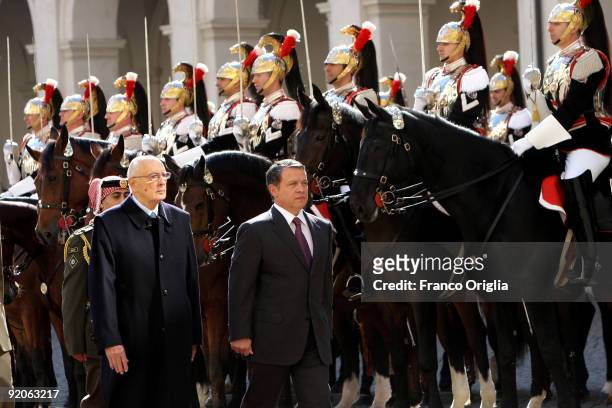 Italian President Giorgio Napolitano and King Abdullah II of Jordan review an honour guard prior their meeting at the Quirinale palace on October 20,...
