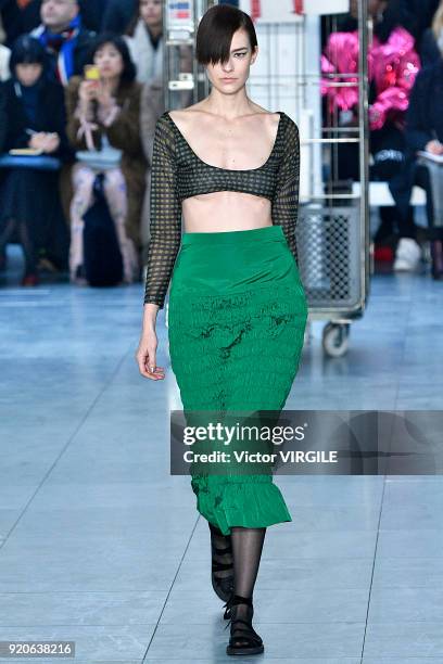 Model walks the runway at the Molly Goddard Ready to Wear Fall/Winter 2018-2019 fashion show during London Fashion Week February 2018 on February 17,...