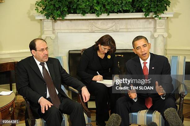 President Barack Obama speaks to the press as he meets with Iraqi Prime Minister Nuri al-Maliki in the Oval Office on October 20, 2009 at the White...