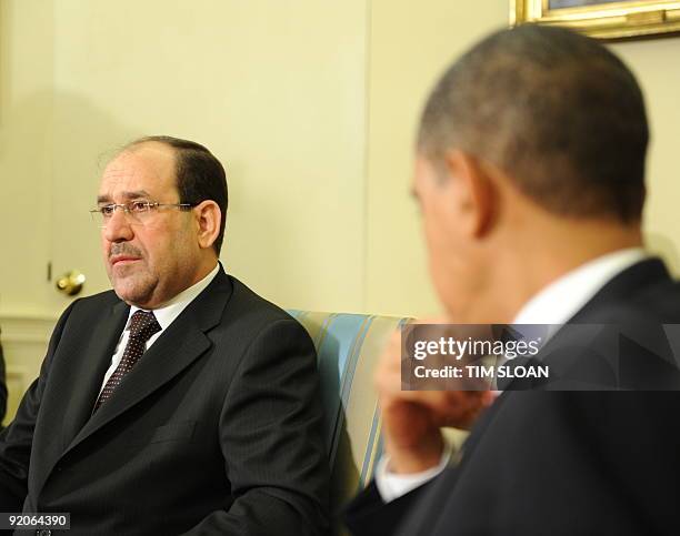 President Barack Obama meets with Iraqi Prime Minister Nuri al-Maliki in the Oval Office on October 20, 2009 at the White House in Washington, DC....