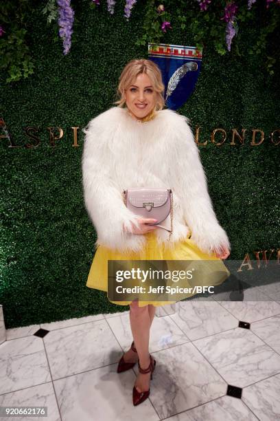 Olivia Cox attends the Aspinal of London Presentation during London Fashion Week February 2018 at Regent Street on February 19, 2018 in London,...