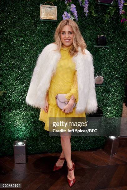 Olivia Cox attends the Aspinal of London Presentation during London Fashion Week February 2018 at Regent Street on February 19, 2018 in London,...
