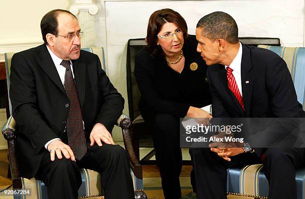 President Barack Obama speaks with Iraqi Prime Minister Nuri al-Maliki during their meeting in the Oval Office of the White House October 20, 2009 in...