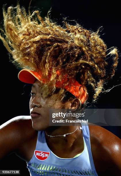 Naomi Osaka of Japan in action against Kristina Mladenovic of France during day one of the WTA Dubai Duty Free Tennis Championship at the Dubai...