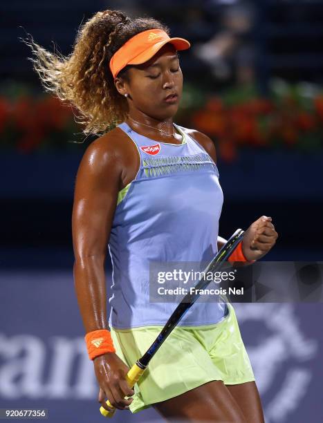 Naomi Osaka of Japan celebrates a point against Kristina Mladenovic of France during day one of the WTA Dubai Duty Free Tennis Championship at the...