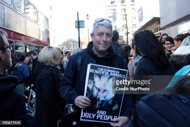 Protester stands in front of British Fashion Council showspace during London Fashion Weak to draw public attention to use of fur in fashion industry...