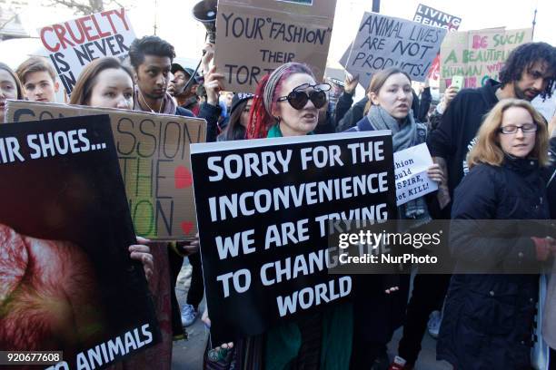 Protesters stand in front of British Fashion Council showspace during London Fashion Weak to draw public attention to use of fur in fashion industry...