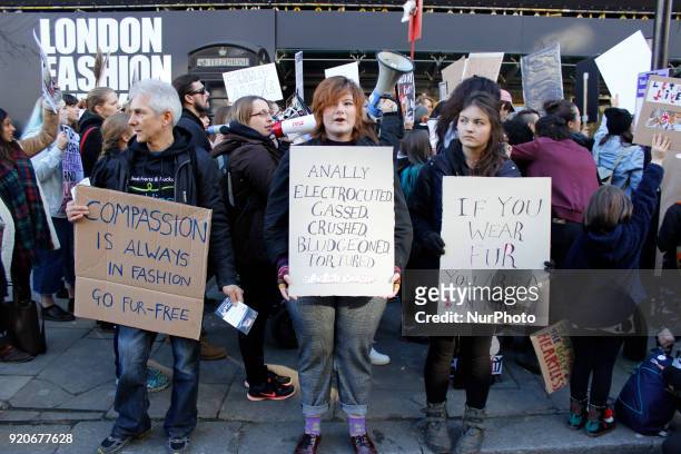 Protesters stand in front of British Fashion Council showspace during London Fashion Weak to draw public attention to use of fur in fashion industry...