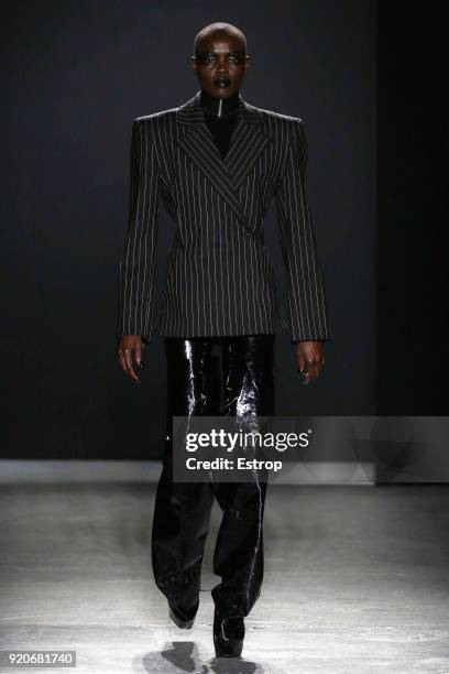 Model walks the runway at the Gareth Pugh show during London Fashion Week February 2018 at Ambika P3 on February 17, 2018 in London, England.