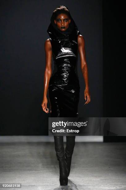 Model walks the runway at the Gareth Pugh show during London Fashion Week February 2018 at Ambika P3 on February 17, 2018 in London, England.