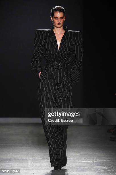 Model walks the runway at the Gareth Pugh show during London Fashion Week February 2018 at Ambika P3 on February 17, 2018 in London, England.