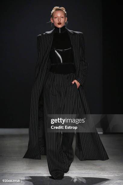 Model walks the runway at the Gareth Pugh show during London Fashion Week February 2018 at Ambika P3 on February 17, 2018 in London, England.