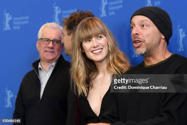 Tim Bevan, Rosamund Pike and Jose Padilha pose at the '7 Days in Entebbe' photo call during the 68th Berlinale International Film Festival Berlin at...