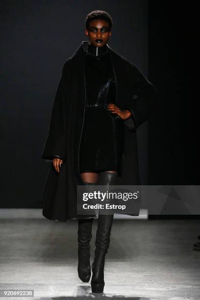 Model walks the runway at the Gareth Pugh show during London Fashion Week February 2018 at Ambika P3 on February 17, 2018 in London, England.