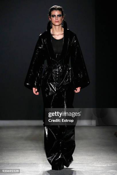 Model walks the runway at the Gareth Pugh show during London Fashion Week February 2018 at Ambika P3 on February 17, 2018 in London, England.