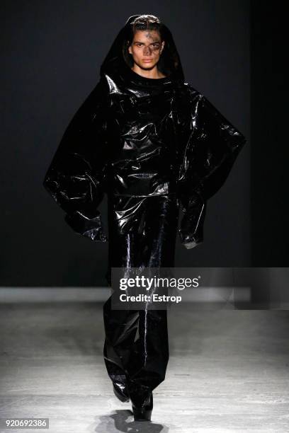 Model walks the runway at the Gareth Pugh show during London Fashion Week February 2018 at Ambika P3 on February 17, 2018 in London, England.