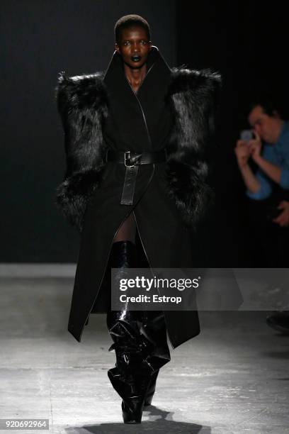 Model walks the runway at the Gareth Pugh show during London Fashion Week February 2018 at Ambika P3 on February 17, 2018 in London, England.