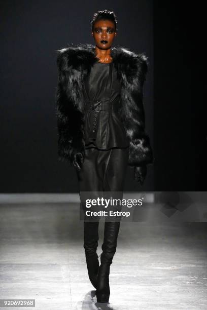 Model walks the runway at the Gareth Pugh show during London Fashion Week February 2018 at Ambika P3 on February 17, 2018 in London, England.