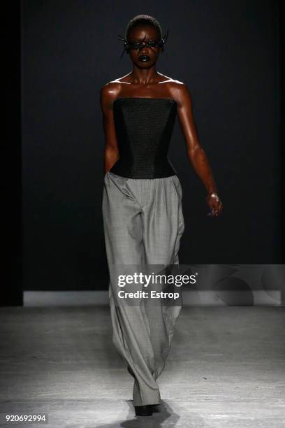 Model walks the runway at the Gareth Pugh show during London Fashion Week February 2018 at Ambika P3 on February 17, 2018 in London, England.