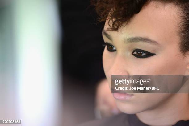Model backstage ahead of the Paula Knorr Presentation during London Fashion Week February 2018 at BFC Show Space on February 19, 2018 in London,...