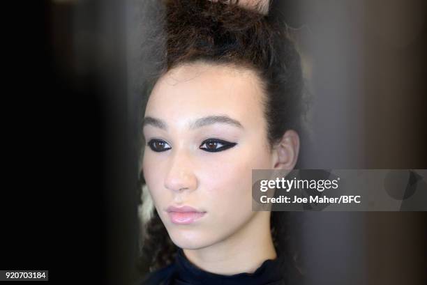 Model backstage ahead of the Paula Knorr Presentation during London Fashion Week February 2018 at BFC Show Space on February 19, 2018 in London,...