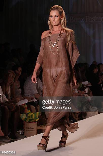 Model walks the runway at the Poko Pano 2010 fashion show during Mercedes-Benz Fashion Week Swim at The Oasis on July 18, 2009 in Miami, Florida.