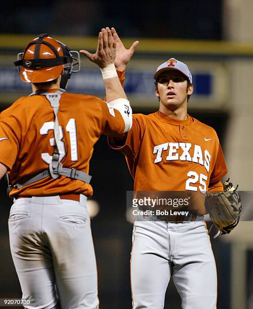 February 14, 2004 - Houston, Texas -Minute Maid Park-Rice Owls vs. Texas Longhorns. Longhorn reliever Huston Street gets a high five from catcher...