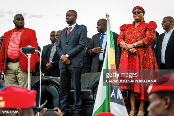Acting president of the Movement for Democratic Change party, Nelson Chamisa , MDC vice-presidents Elias Mudzuri and Thokozani Khupe observe a minute...