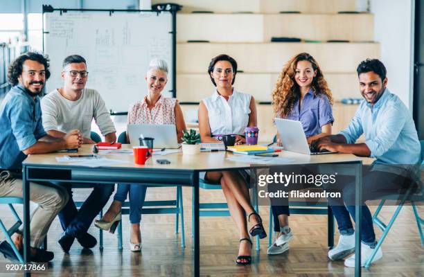 team of professionals - igualdade imagens e fotografias de stock