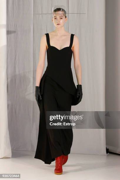 Model walks the runway at the Chalayan show during London Fashion Week February 2018 at Sadlers Wells Theatre on February 17, 2018 in London, England.