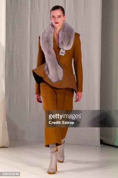 Model walks the runway at the Chalayan show during London Fashion Week February 2018 at Sadlers Wells Theatre on February 17, 2018 in London, England.