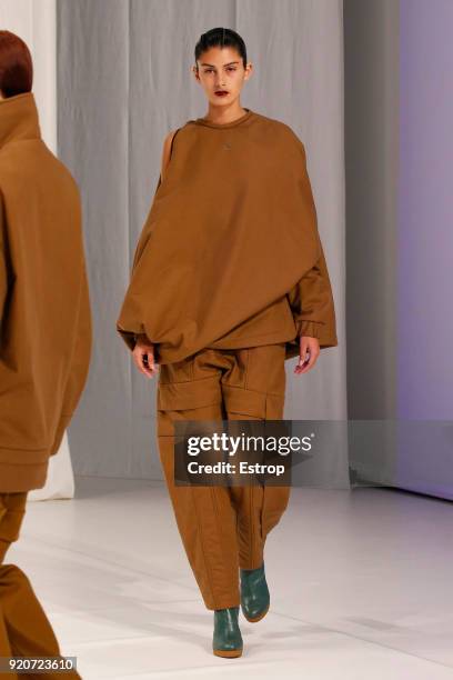 Model walks the runway at the Chalayan show during London Fashion Week February 2018 at Sadlers Wells Theatre on February 17, 2018 in London, England.