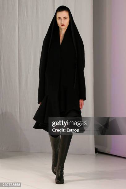 Model walks the runway at the Chalayan show during London Fashion Week February 2018 at Sadlers Wells Theatre on February 17, 2018 in London, England.